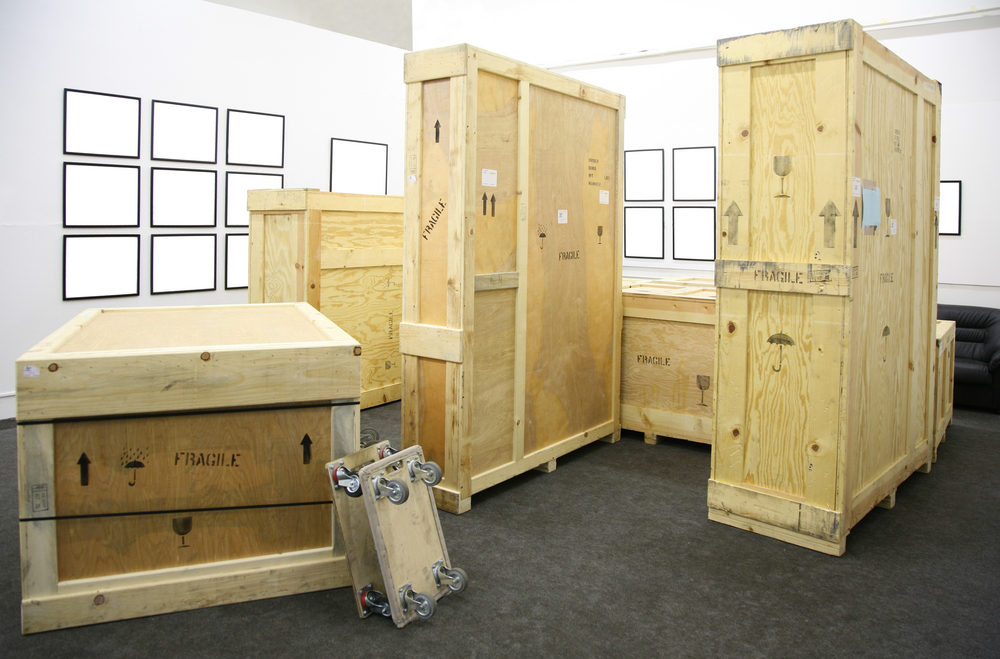 Boxes used in conjunction with corrosion inhibitors protect valuable assets during transport